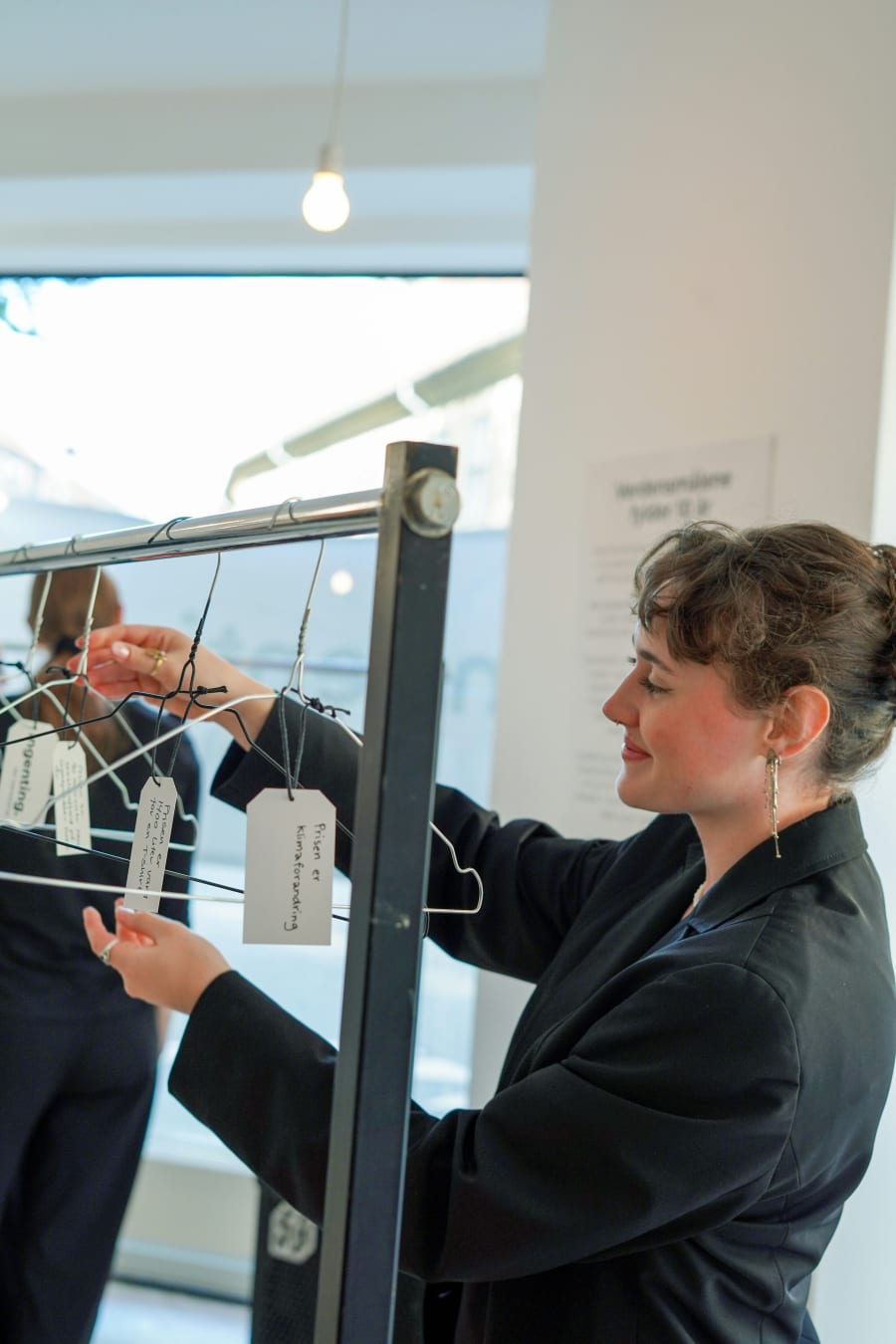 Butikkens åbning blev fejret med champagne, åbningstaler og goodiebags med ingenting. Foto: Eva Søe Olsen